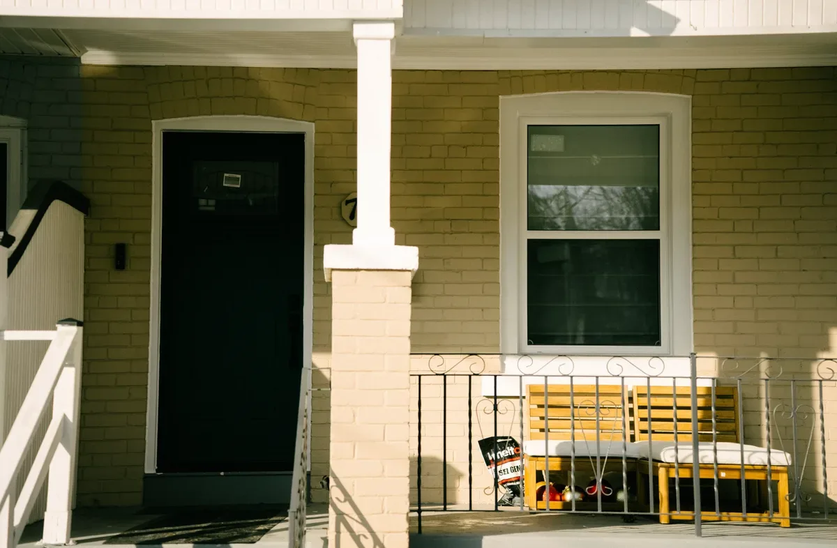 Installer fitting a new energy-efficient patio door in a Vaughan home